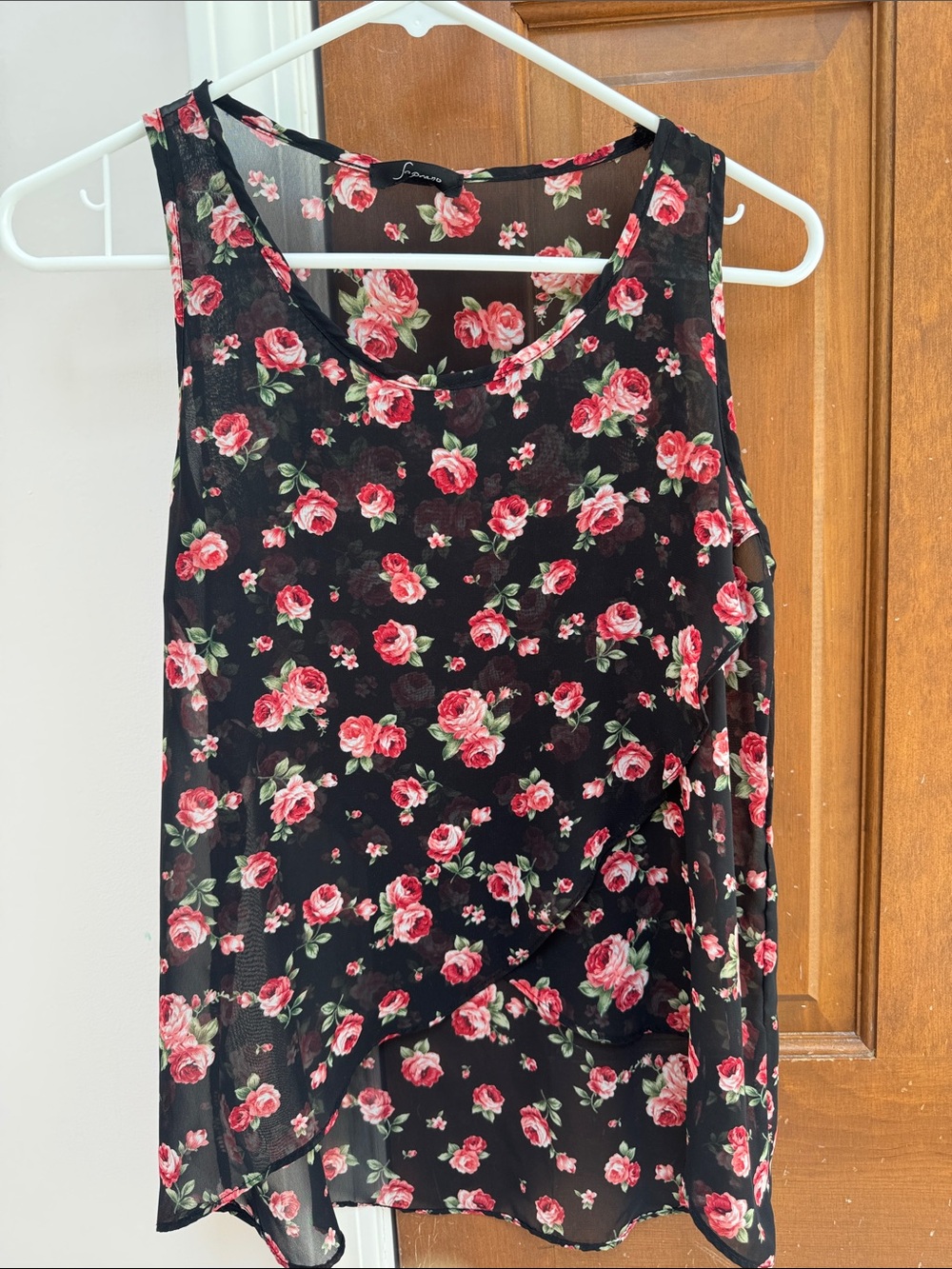 Soprano black sheer tank top featuring a floral print with a high-low hemline.